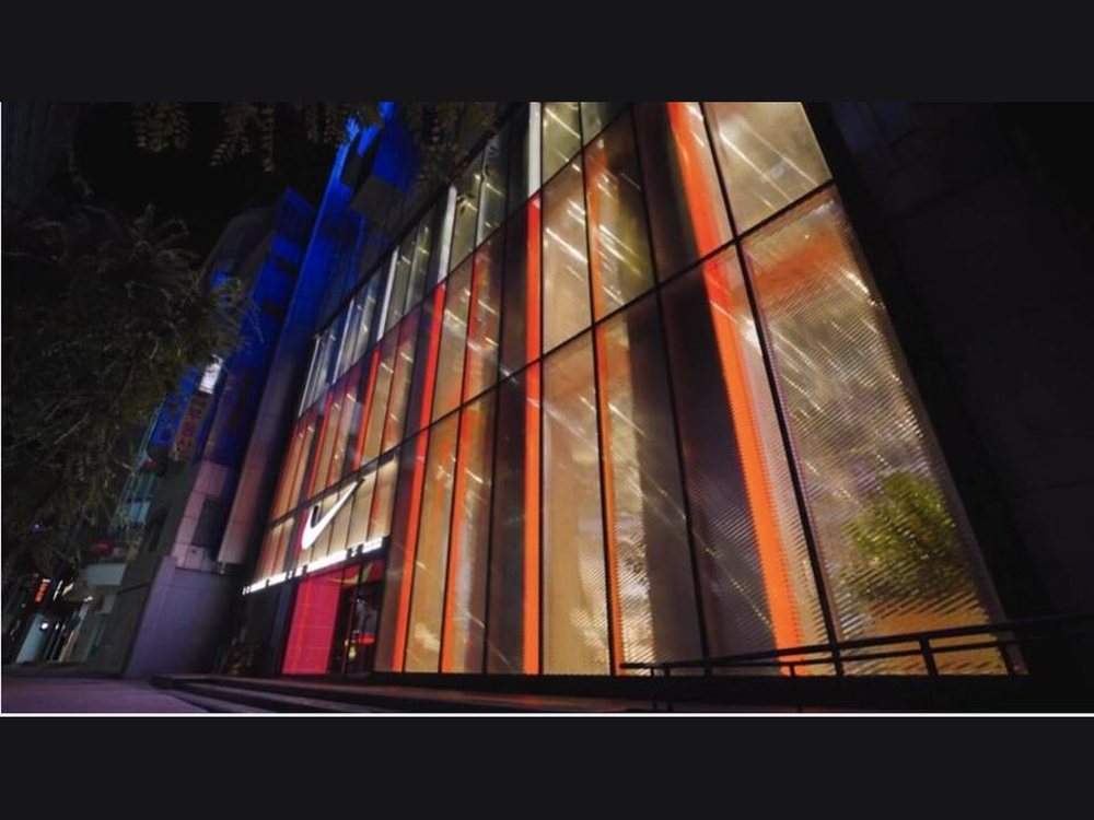 Nike Rise Seoul facade at night