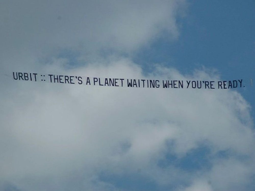 Skywriting banner: there’s a planet waiting when you’re ready